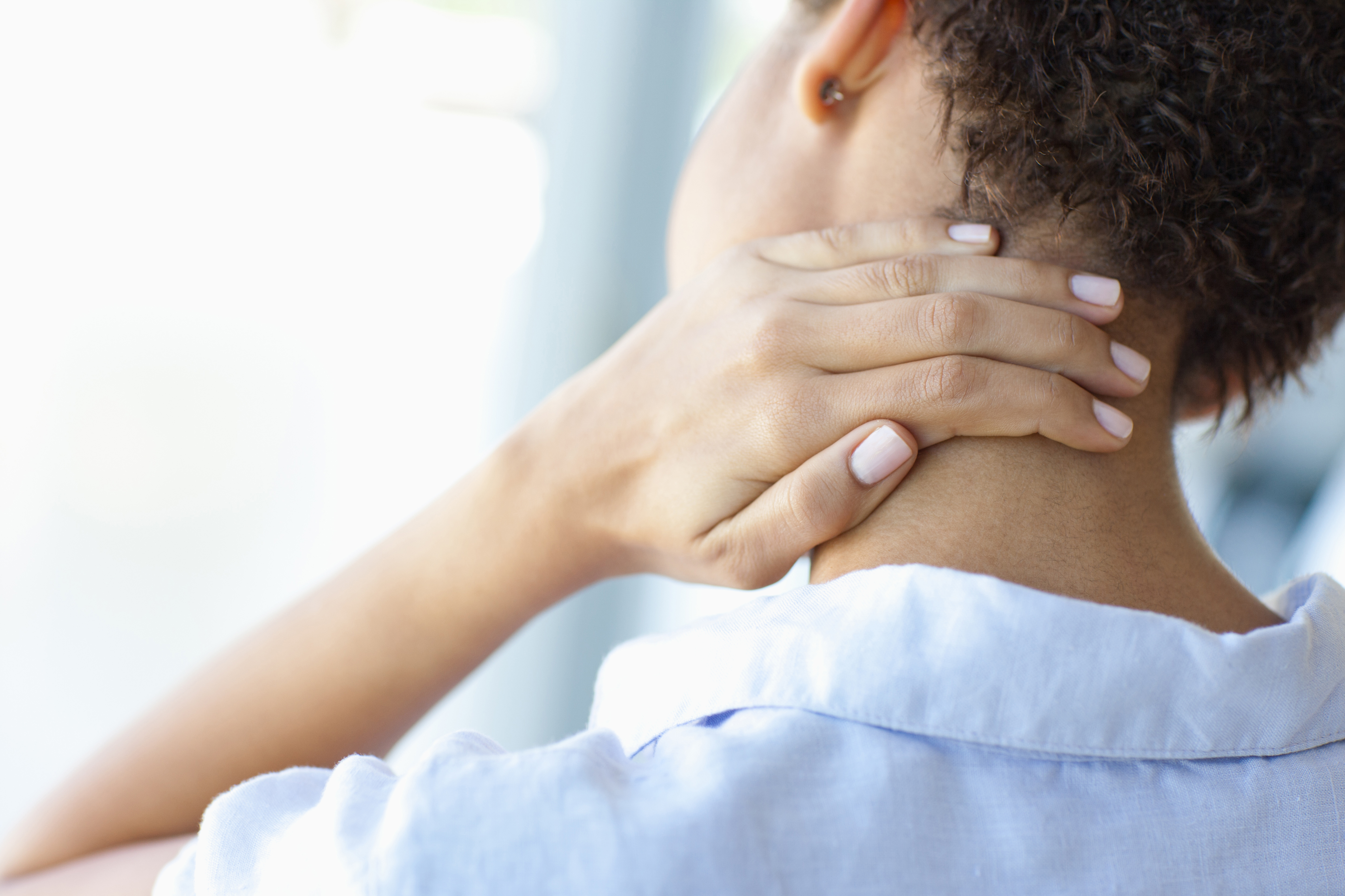 Woman with neck pain 